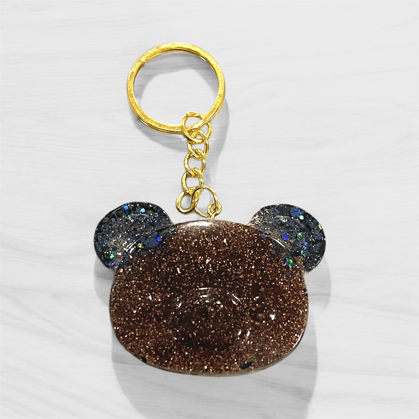 Handmade brown glitter bear keychain with holographic ears and gold hardware, perfect for animal lovers and pet parents